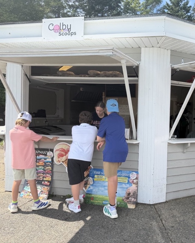 Camp kids ordering at the Colby Scoops ice cream window